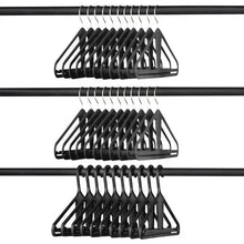 Kangaroo hanger set showing stacked black hangers with slotted shoulder bars and curved hooks