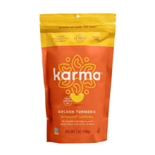 Turmeric-wrapped cashew snack bag with Karma logo and golden turmeric label