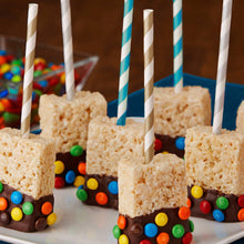 Rice Krispies Treats bars on sticks with colorful candy pieces