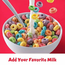 Froot Loops cereal in a white bowl with milk pouring and multicolor ring shapes