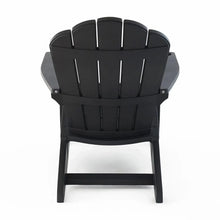 Dark gray Adirondack chair back view with rounded top and slatted back boards