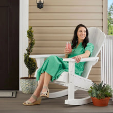 White rocking Adirondack chair with wide armrests and curved rocking base