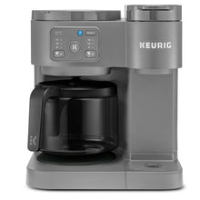 Grey KEURIG single-serve coffee and carafe brewer with control panel and black pod holder