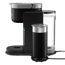 Black single-serve coffee maker with frother cup and clear reservoir