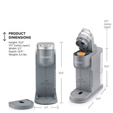 Gray single-serve coffee maker on base with labeled product dimensions layout