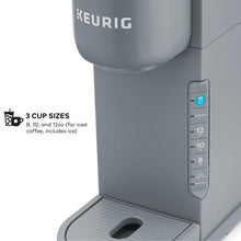 Gray single-serve coffee maker front panel with strength and cup size buttons