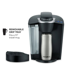 Keurig® single-serve coffee maker with removable drip tray and stainless travel mug