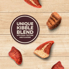 Dry dog food kibble blend pieces with 'unique kibble blend' badge