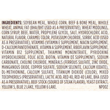Dry dog food ingredients panel listing soybean meal, corn, beef and bone meal