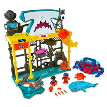 Ocean adventure playset with shark station, toy submarines, and small sea-animal pieces
