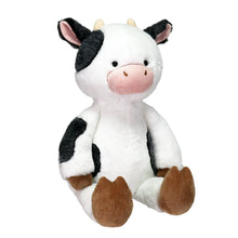 Plush cow stuffed animal, white with black patches, brown hooves, cute face