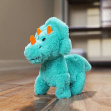 Teal triceratops mini walking plush pet standing, orange horn accents