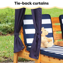 Kids chaise lounge canopy with tie-back curtains and striped cushions