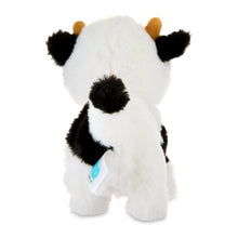 Mini plush walking cow toy, white with black patches, side view with hanging tag