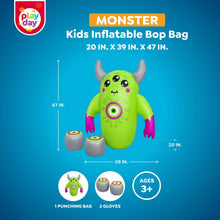Green monster inflatable bop bag with boxing gloves and two gray punching balls