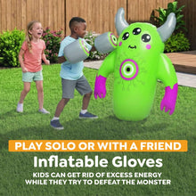Inflatable monster bop bag with boxing gloves and two gray punching balls