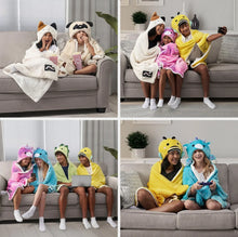 Kids hooded throws in cow and dinosaur styles being worn indoors on a sofa