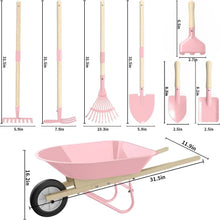 Pink kids wheelbarrow with wooden-handled gardening tools and accessories