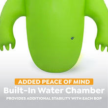 Green inflatable monster bop bag body with purple arm accents and central target
