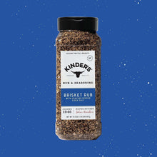 Kinder's Brisket Rub bottle against blue background, black cap and spice blend.