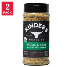 Garlic & herb seasoning bottle, sea salt and lemon label, black cap on front view.