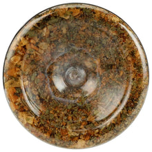 Roasted veggie seasoning spice flakes in a clear dish