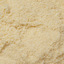 Fine, pale yellow almond flour powder texture