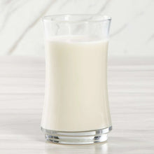 Glass of light almond milk