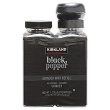 Black pepper grinder set: two glass bottles with black caps, KIRKLAND label