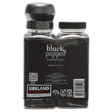 Black pepper grinder set: two bottles with black caps and KIRKLAND back labels