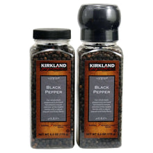 Black pepper grinder set: two bottles with black caps and KIRKLAND black pepper labels