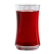 Glass filled with red cranberry juice