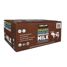 Organic reduced fat chocolate milk carton case, brown with Kirkland logo and product details.