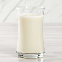 Glass of creamy vanilla soy beverage