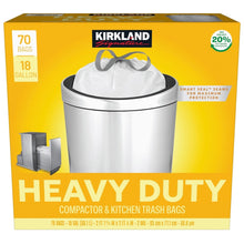 Kirkland Signature 18-gallon heavy-duty trash bag box, showing a bag in a metal bin