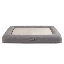 Gray 2-in-1 bolster pet bed with open cushioned insert and Kirkland logo patch