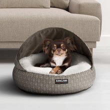 Round hooded pet bed, dark hood, light gray woven base, white cushion, Kirkland logo
