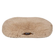 Taupe round oval pet bed, plush faux-fur with Kirkland logo patch