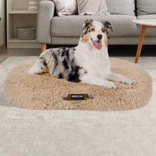 Taupe faux-fur pet bed with Kirkland logo patch, oval 40 x 32 in