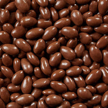 Milk chocolate-covered almonds, glossy brown oval pieces