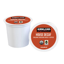 Organic medium roast decaf coffee K-Cup pods, two white cups with orange lids