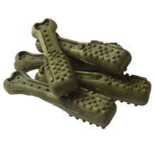 Green bone-shaped dog dental chews with raised cleaning nubs