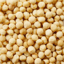 Dry roasted macadamia nuts, pale golden spheres