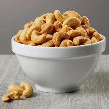 Bowl filled with whole unsalted cashews