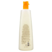 Kirkland Signature liquid body wash bottle with orange pump, ingredient text