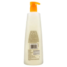 Kirkland Signature liquid body wash bottle with orange pump, back label