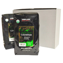 Organic decaf whole bean coffee bags, medium-dark roast, in cardboard holder