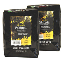 Two Organic Ethiopia whole bean coffee bags, light roast, side-by-side dark foil pouches