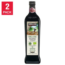 Organic balsamic vinegar bottle with front label and dark glass stopper