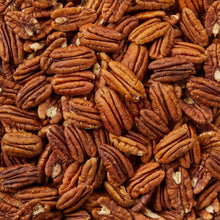 Pecan halves close-up in brown toasted pieces